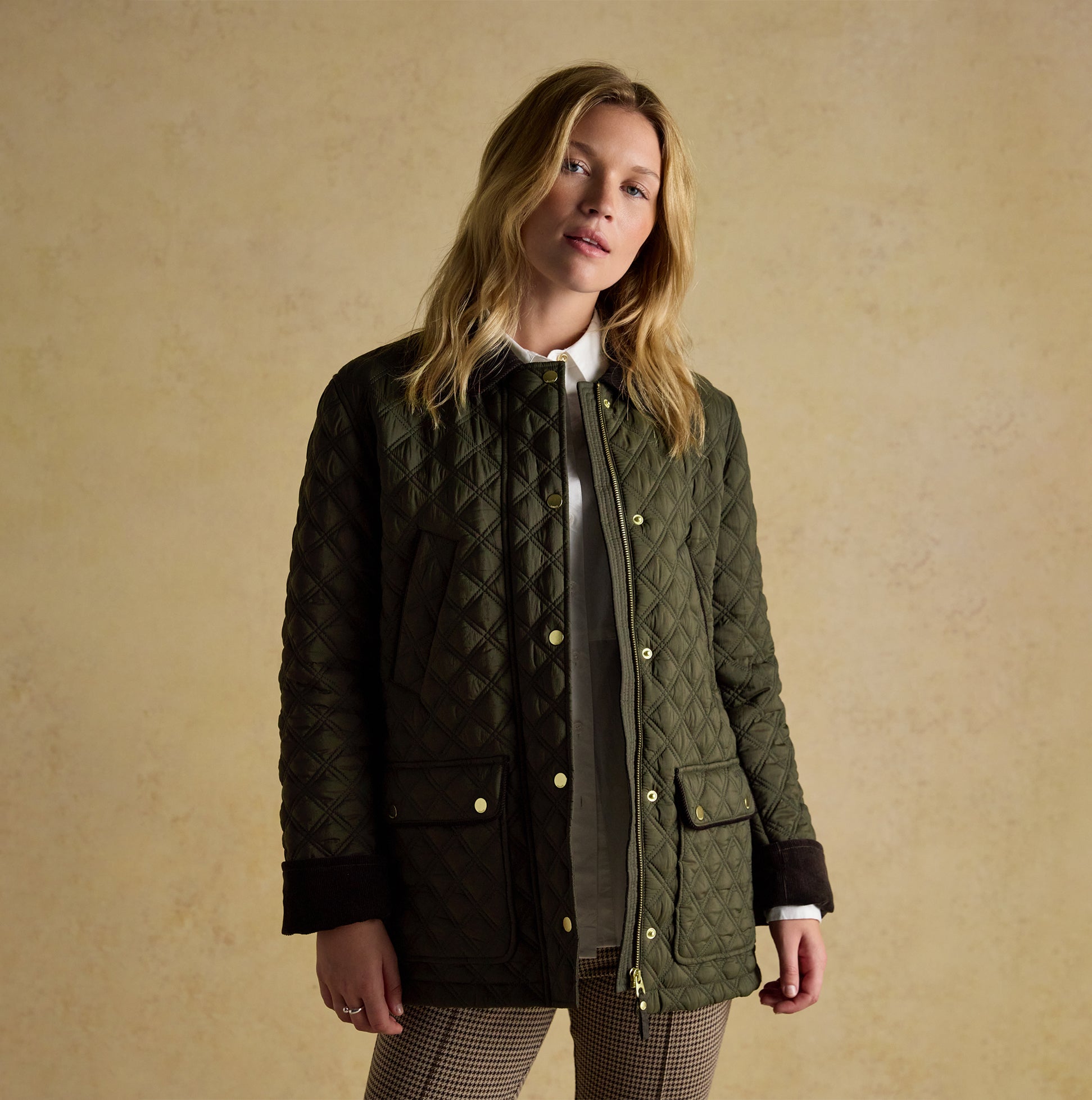 Joules BEATRIX Womens Showerproof Quilted Coat Khaki Green front view with model, featuring button and zip closure.