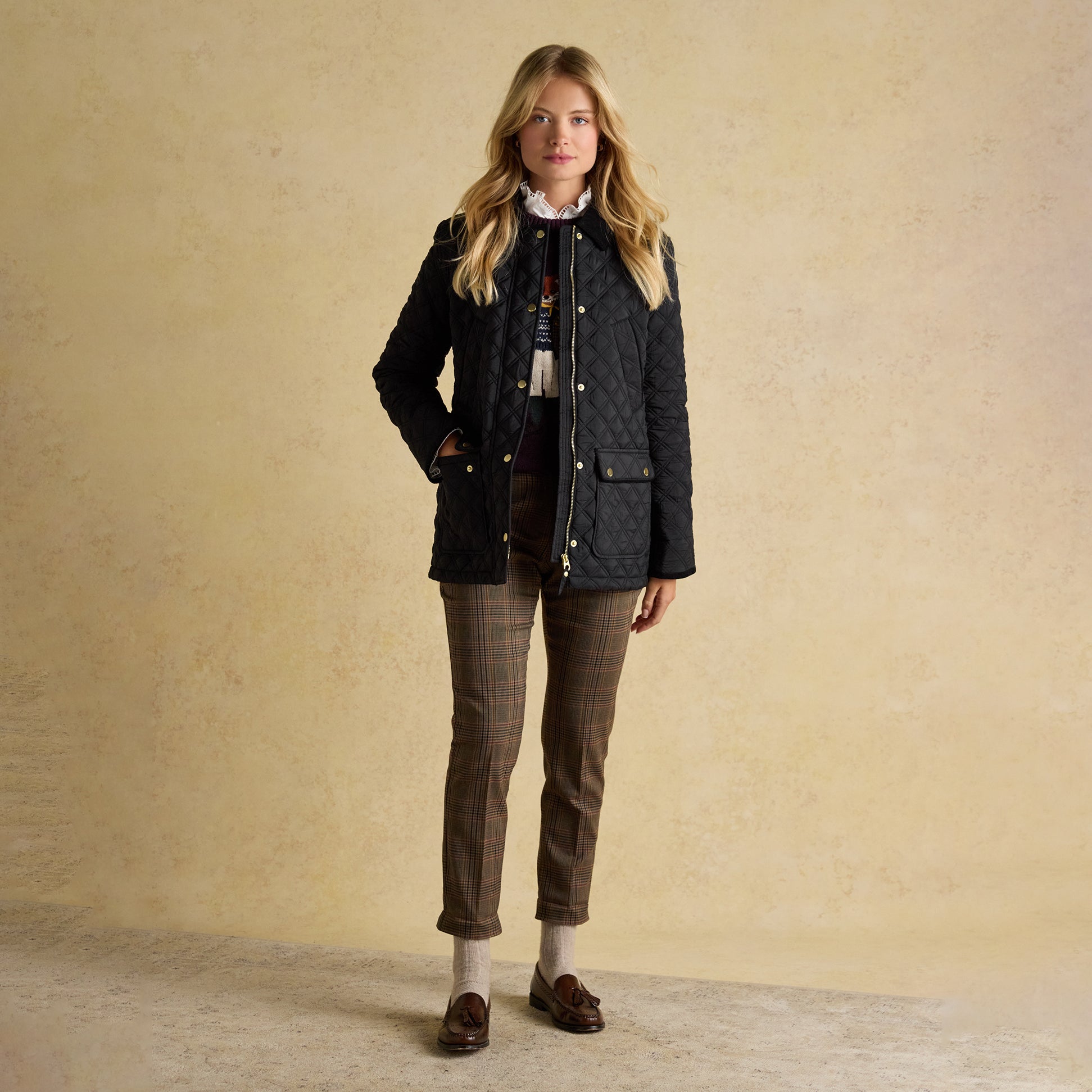 Joules BEATRIX Womens Heritage Quilted Coat Black front view on a model, featuring button and zip closure, casual style.