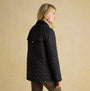 Joules BEATRIX Womens Heritage Quilted Coat Black side view showing button closure and diamond quilted pattern.