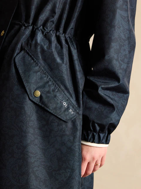 Joules HOLKHAM Womens Raincoat Navy Paisley detail view showcasing adjustable waist and side pocket design.