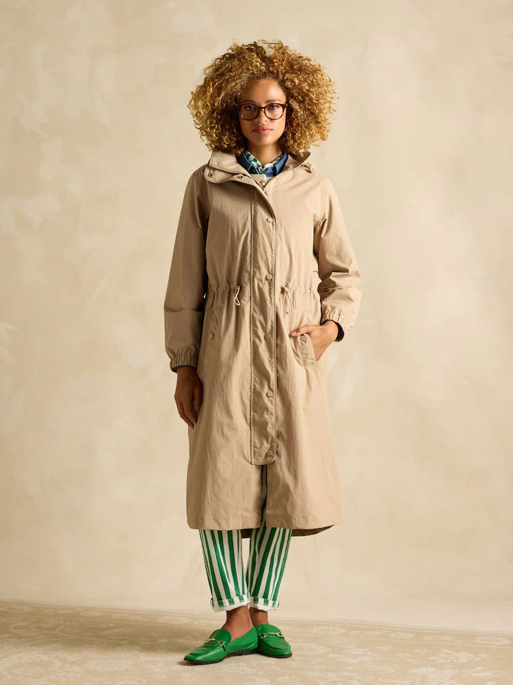 Joules Hensley Womens Waterproof Longline Coat with Packable Hood Tan Brown front view, showcasing a stylish and practical design.