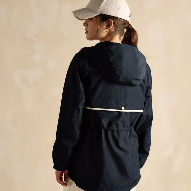 Joules Holt Waterproof Packable Raincoat with Hood Navy, back view showing hood and adjustable waist on model.