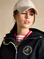 Joules Holt Waterproof Packable Raincoat with Hood Navy front view worn by model, showcasing hood and zipper detail.