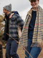 Joules LANGTREE Womens Scarf Henson Check front view with model wearing a check pattern scarf outdoors.