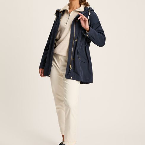 Joules PORTWELL Waterproof Hoodie Raincoat With Adjustable French Navy front view, model wearing it with relaxed fit and stylish look.