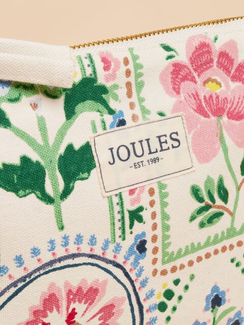 Joules CARRYWELL Womens Pouch Mosaic Floral detail view showing floral pattern and branded tab.