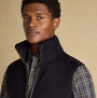 Joules HERITAGE FLEECE Mens Gilet Black front view on model showcasing zip fastening and sleeveless design.