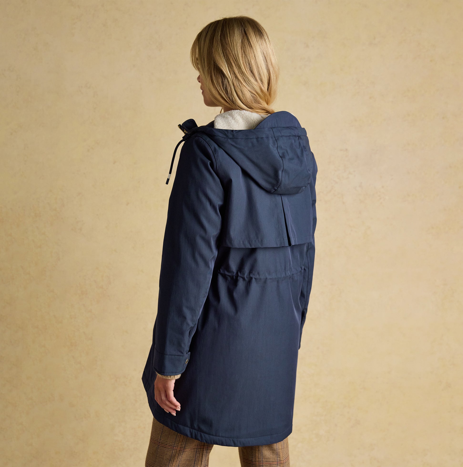 Joules PORTWELL Waterproof Hoodie Raincoat With Adjustable Waist Navy, back view, showcasing the hood and adjustable waist.