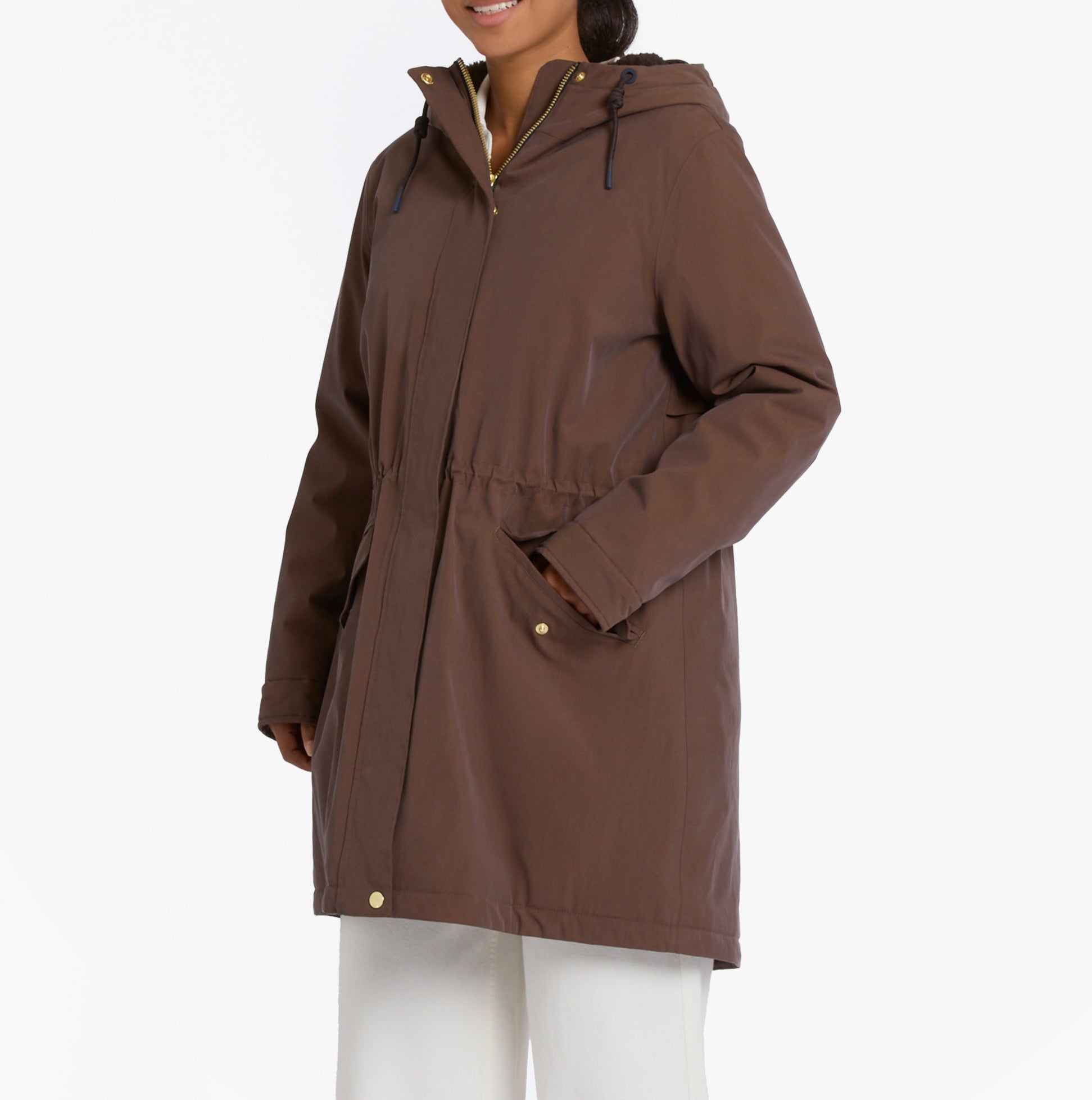 Joules PORTWELL Waterproof Hoodie Raincoat With Adjustable Waist Brown front view on model, showcasing hood and adjustable waist feature.