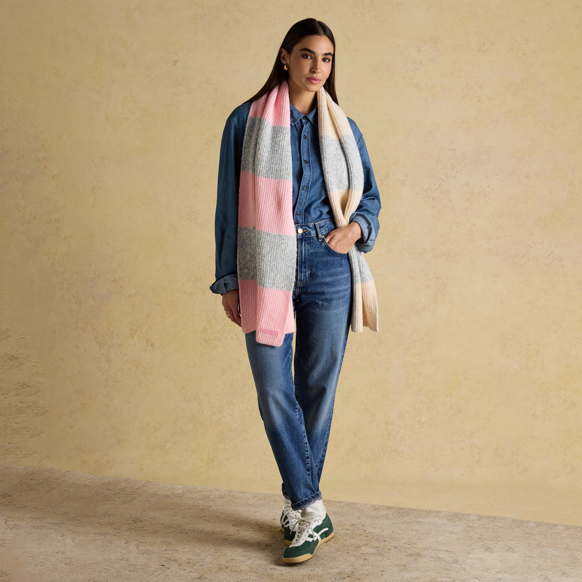 Joules POPLEY STRIPE Womens Winter Pink/Grey front view model wearing pink and grey striped scarf.
