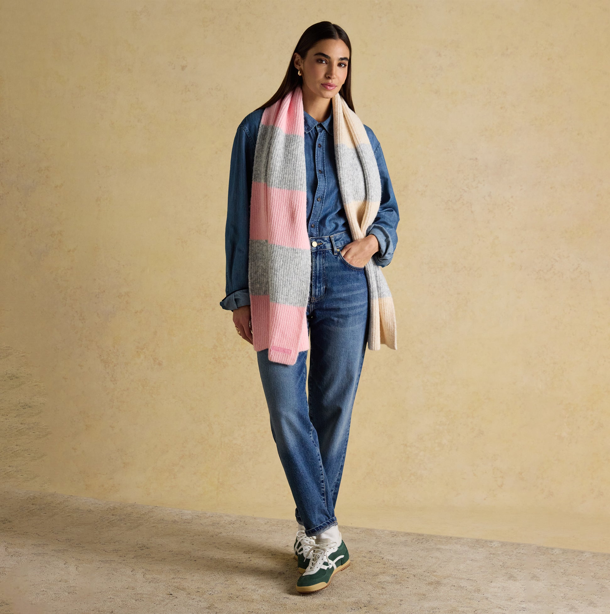 Joules POPLEY STRIPE Womens Winter Pink/Grey front view model wearing pink and grey striped scarf.