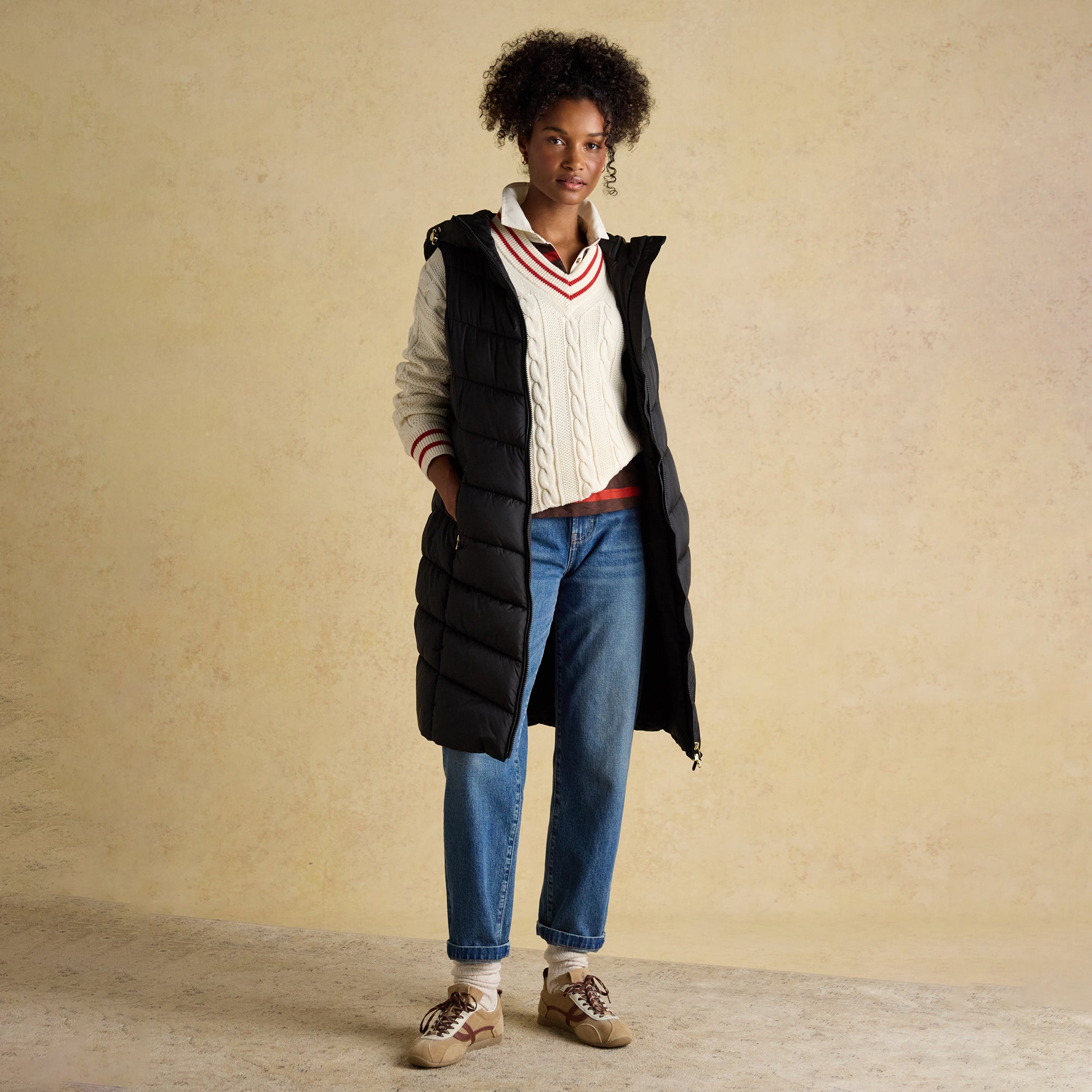 Joules MOORSDALE Womens Longline Showerproof Padded Gilet Black front view on model, paired with a casual outfit.