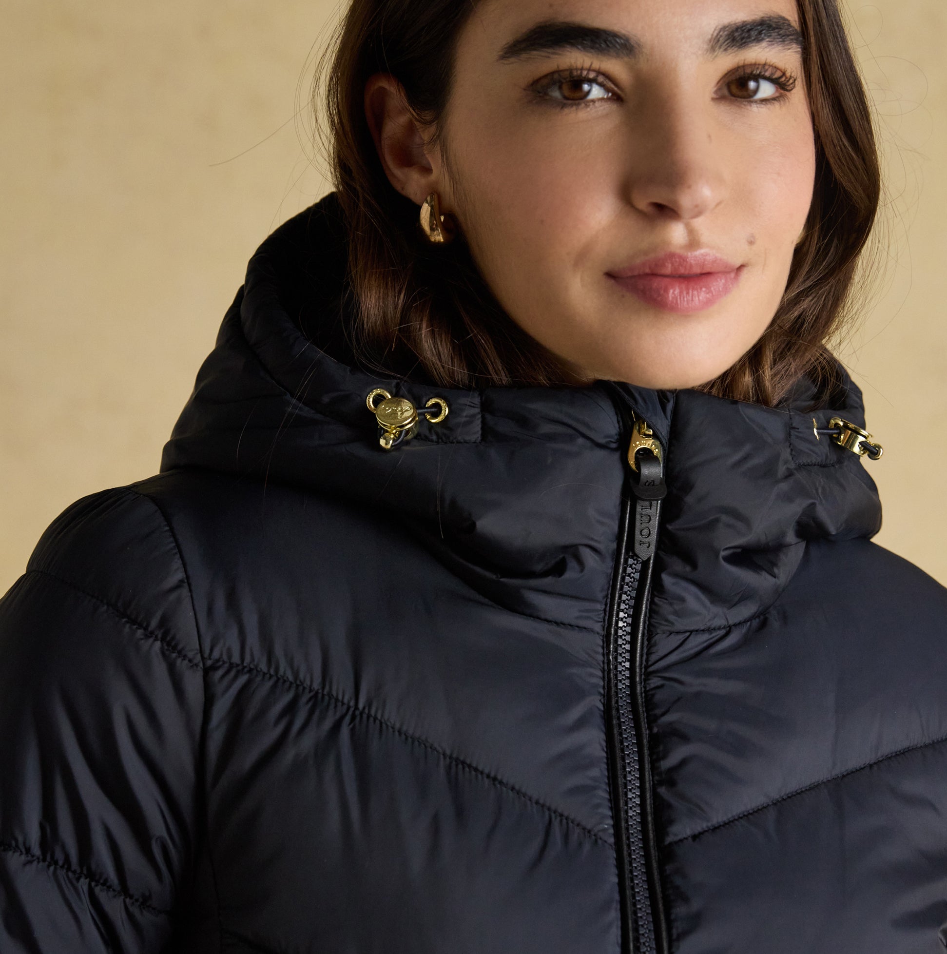 Joules MOORSDALE Womens Long Coat Navy detail view showcasing zip and hood features on a model.