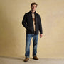 Joules MAYNARD Mens Diamond Quilted Jacket Black front view on model standing with jeans.