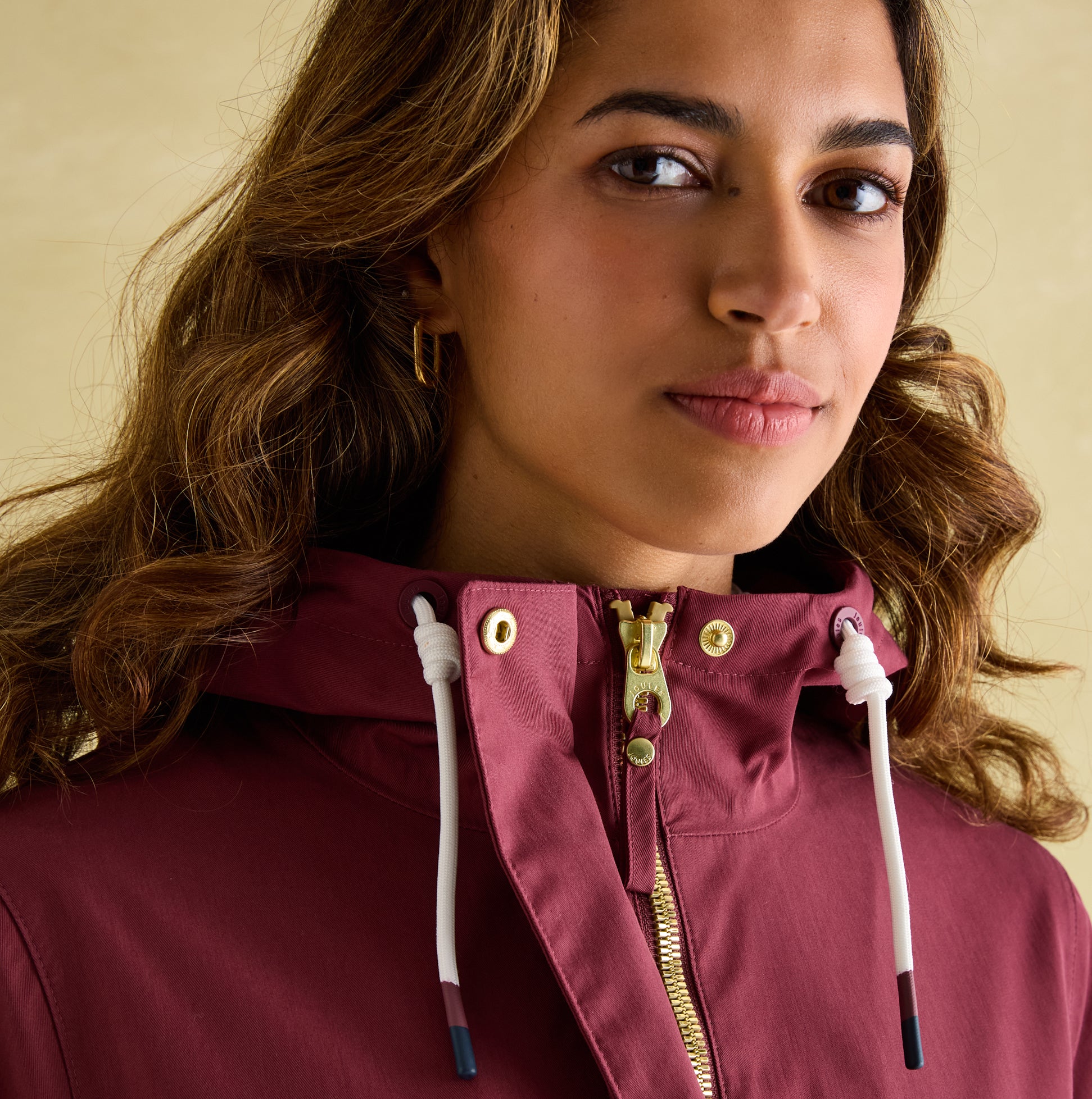 Joules PORTWELL Womens Raincoat Port close-up detail view showcasing adjustable hood and zipper.