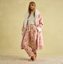 Joules STELLA Womens Pyjama Bottoms Pink Dogs front view, featuring a relaxed fit with hand-drawn dog print and elasticated waist.