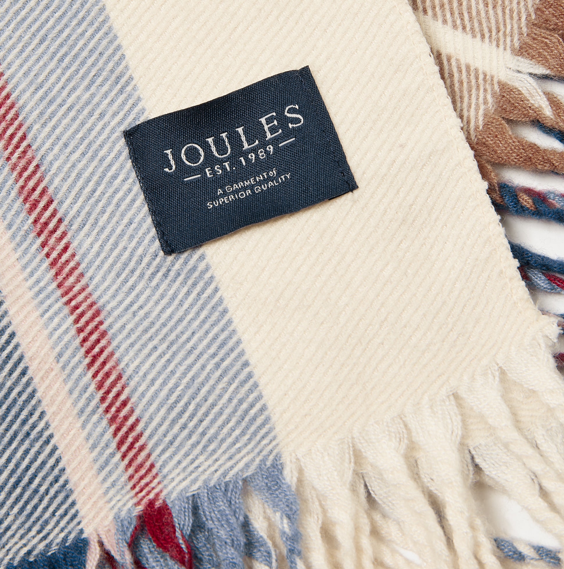 Close-up detail view of Joules LANGTREE Womens Scarf Cream Check showing brand label and woven texture.