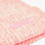 Joules CAVERSHAM Womens Beanie Pink detail view showing the fabric texture and logo tag.