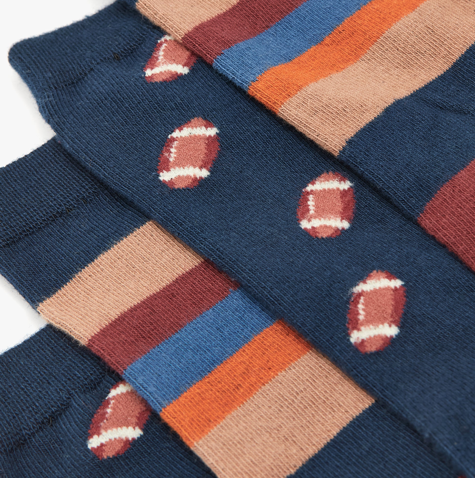 Joules KINGSBURY 2-Pack Mens Socks Navy Burgundy detail view showcasing striped socks with football patterns.