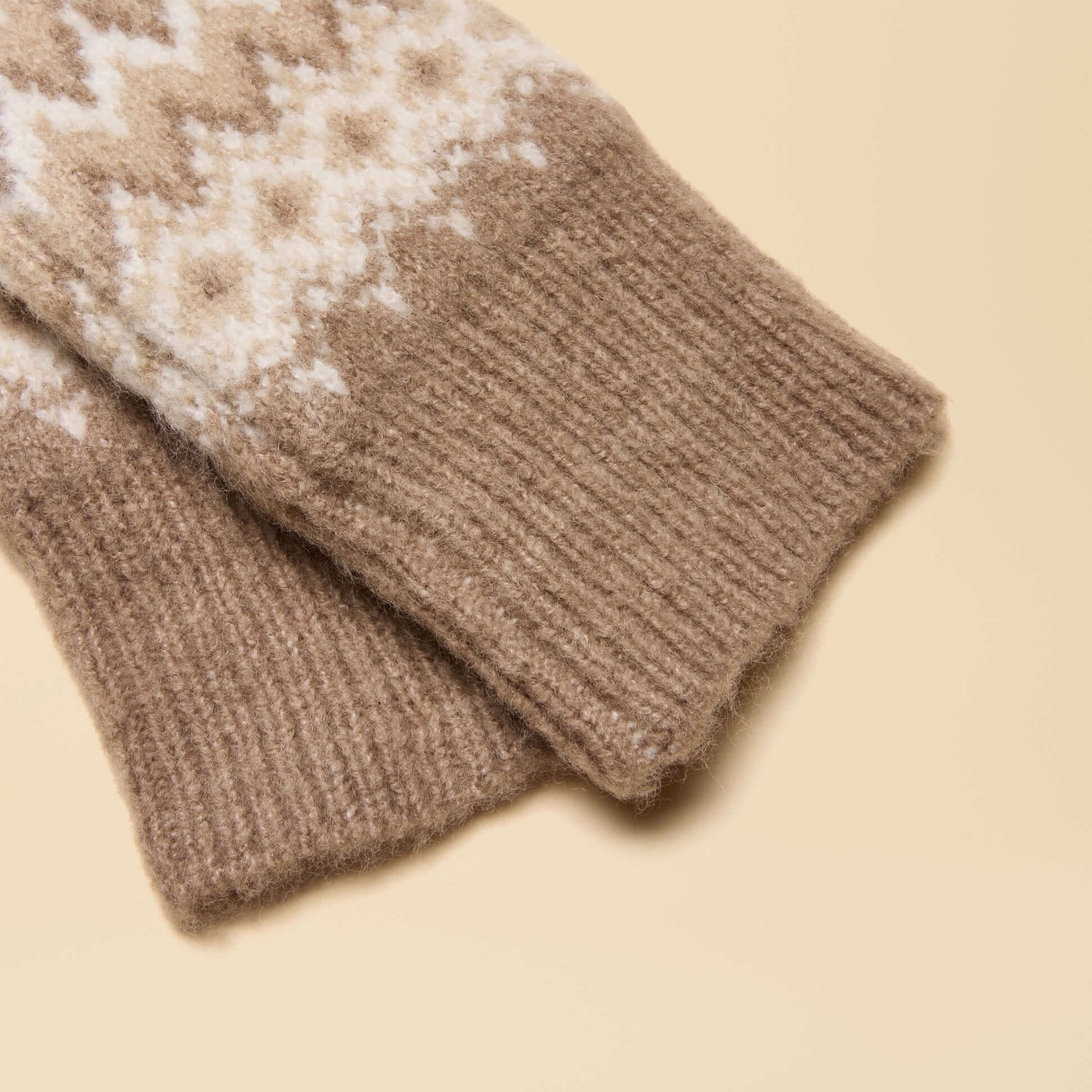 Joules KARA Neutral Fingerless Fairisle Glove Beige detail view showcasing soft fabric and pattern.