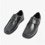Kickers 114226 FRAGMA STRAP Boys School Shoes Black side view with touch fasten strap, leather upper, and rubber sole.