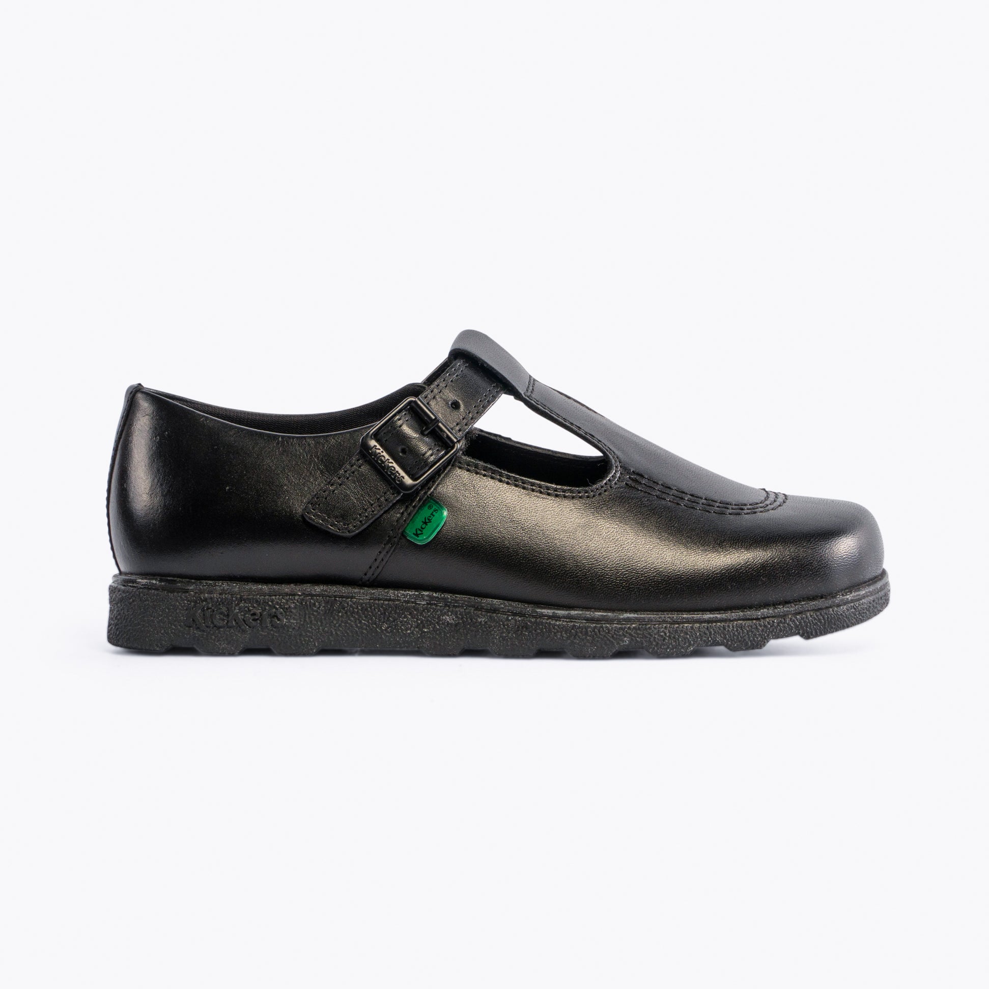 Kickers 115711 FRAGMA T-BUCKLE Girls School Shoes Black side view showing buckle design and smooth leather finish.