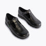 Kickers 115711 FRAGMA T-BUCKLE Girls School Shoes Black front view showcasing leather upper and buckle closure.