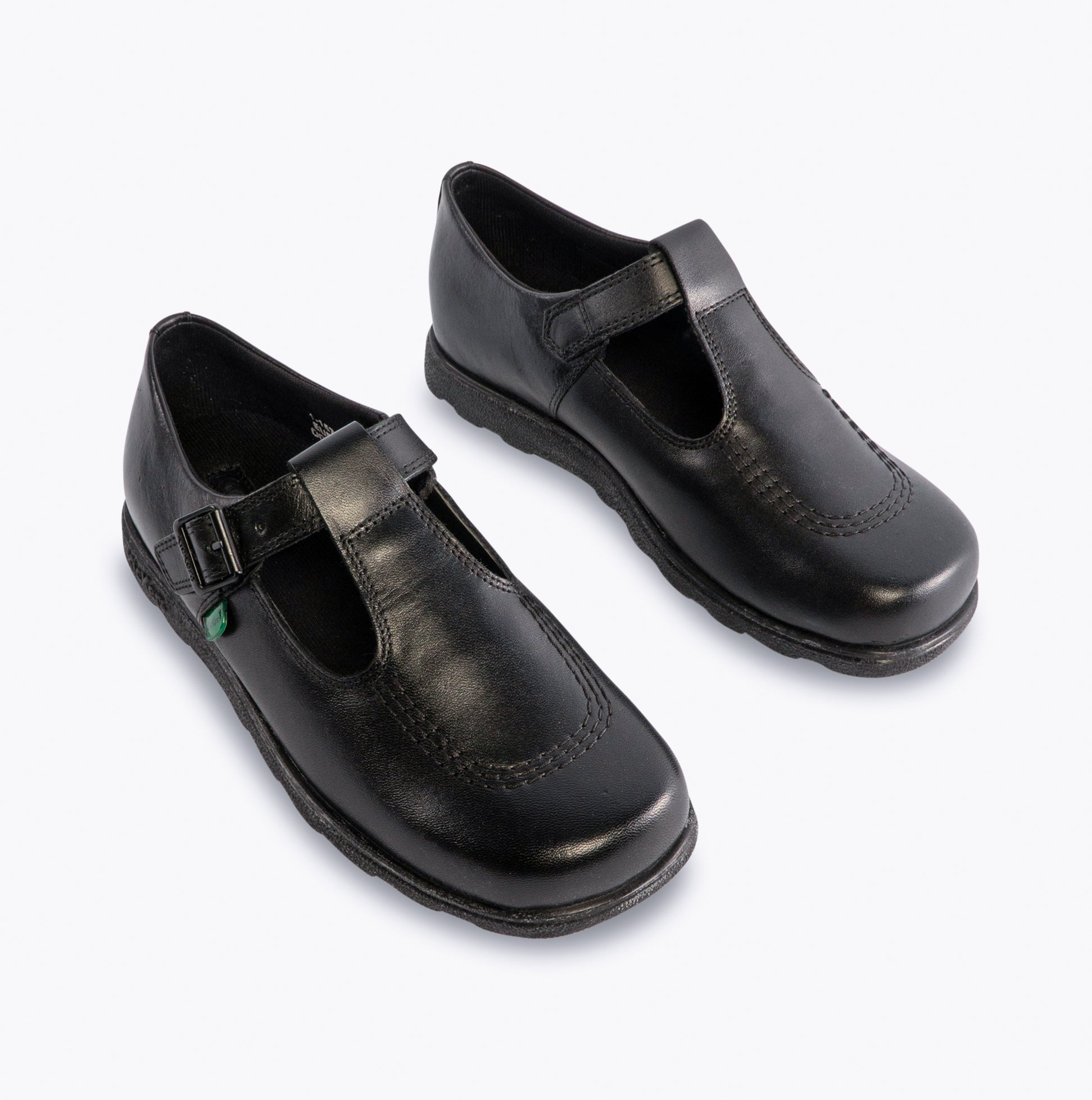 Kickers 115711 FRAGMA T-BUCKLE Girls School Shoes Black front view showcasing leather upper and buckle closure.