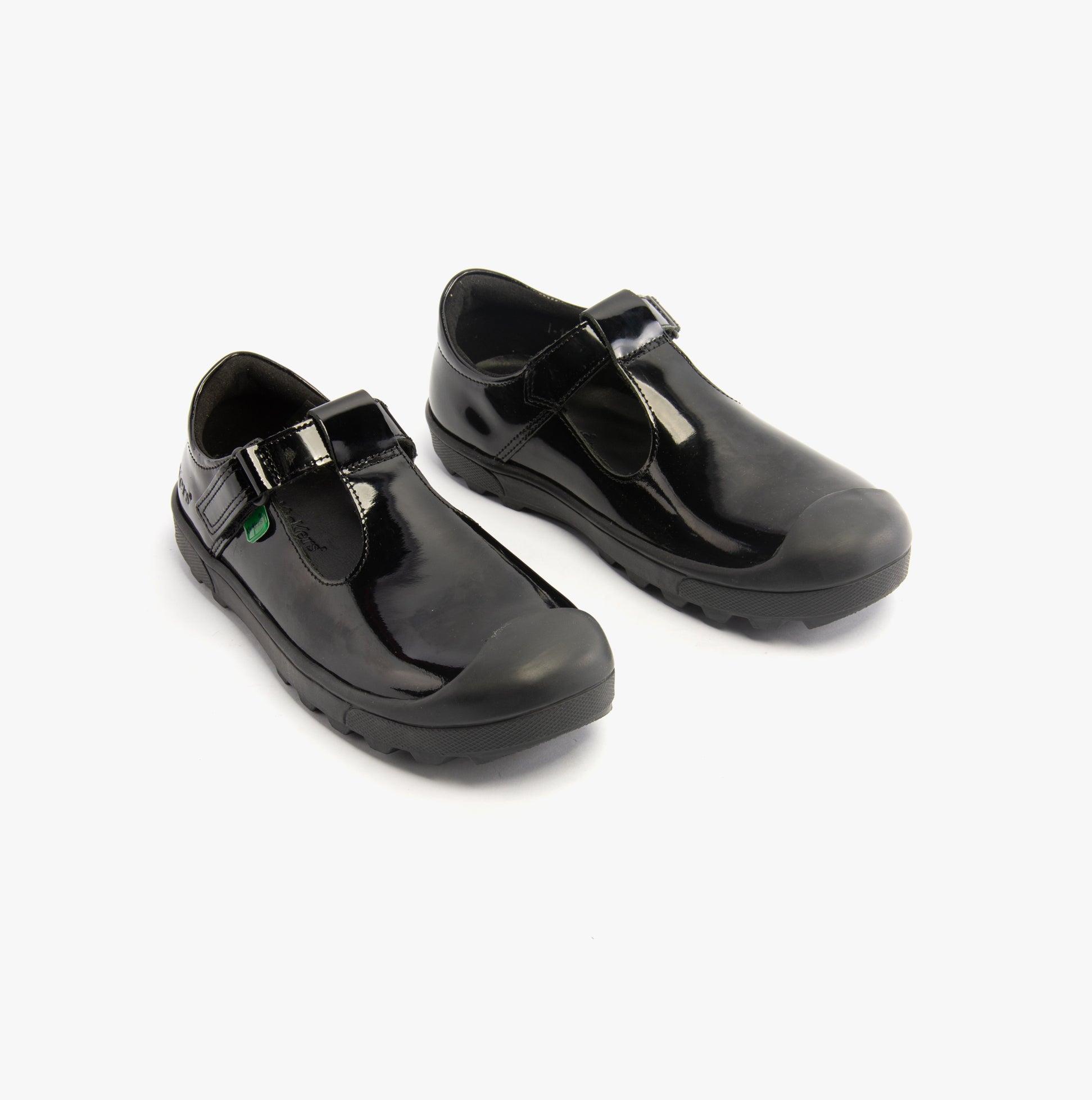 Kickers 116227 PLUNK MJ Girls School Shoes Black Patent side view showcasing shiny leather design.