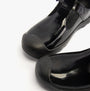 Kickers 116227 PLUNK MJ Girls School Shoes Black Patent top view close-up showing shiny patent finish and rounded toe.