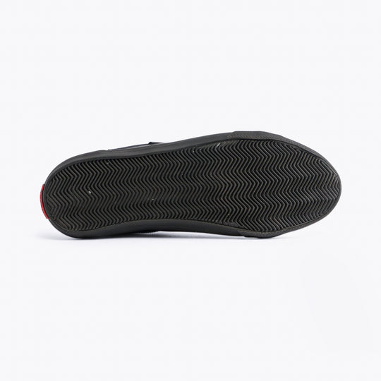 Kickers 116407 KODY LO Unisex School Shoes Black bottom view showing rubber sole with texture design.