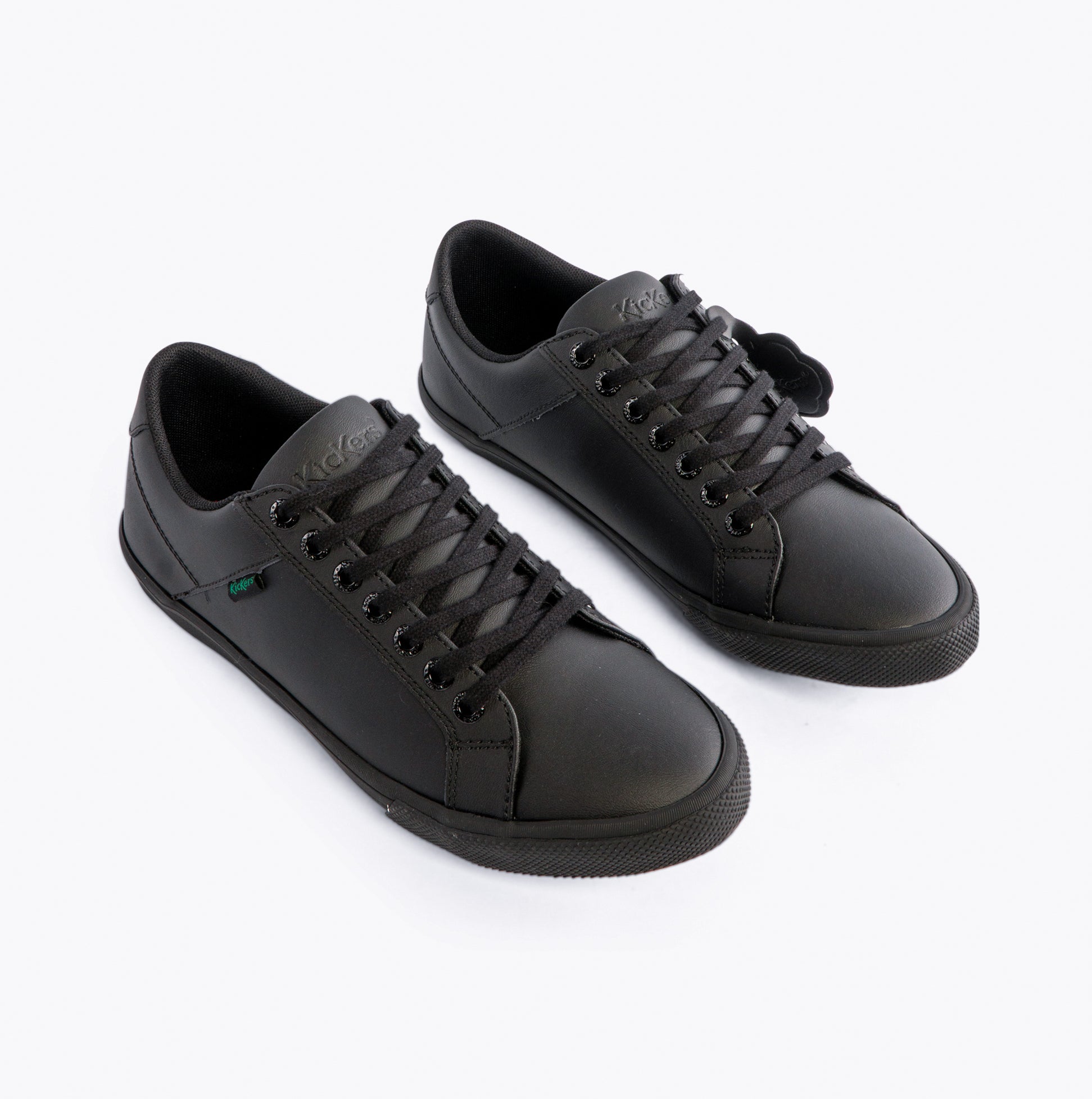 Kickers 116407 KODY LO Unisex School Shoes Black side view showcasing classic lace-up design and low top style.