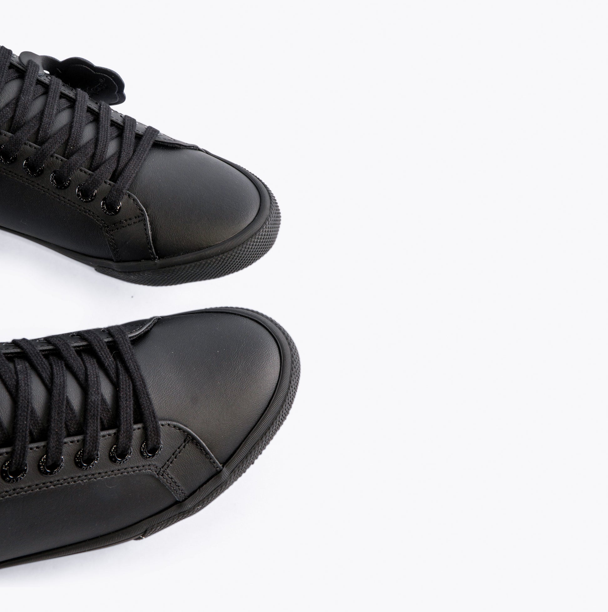 Kickers 116407 KODY LO Unisex School Shoes Black top view showing lace-up design and rubber sole.