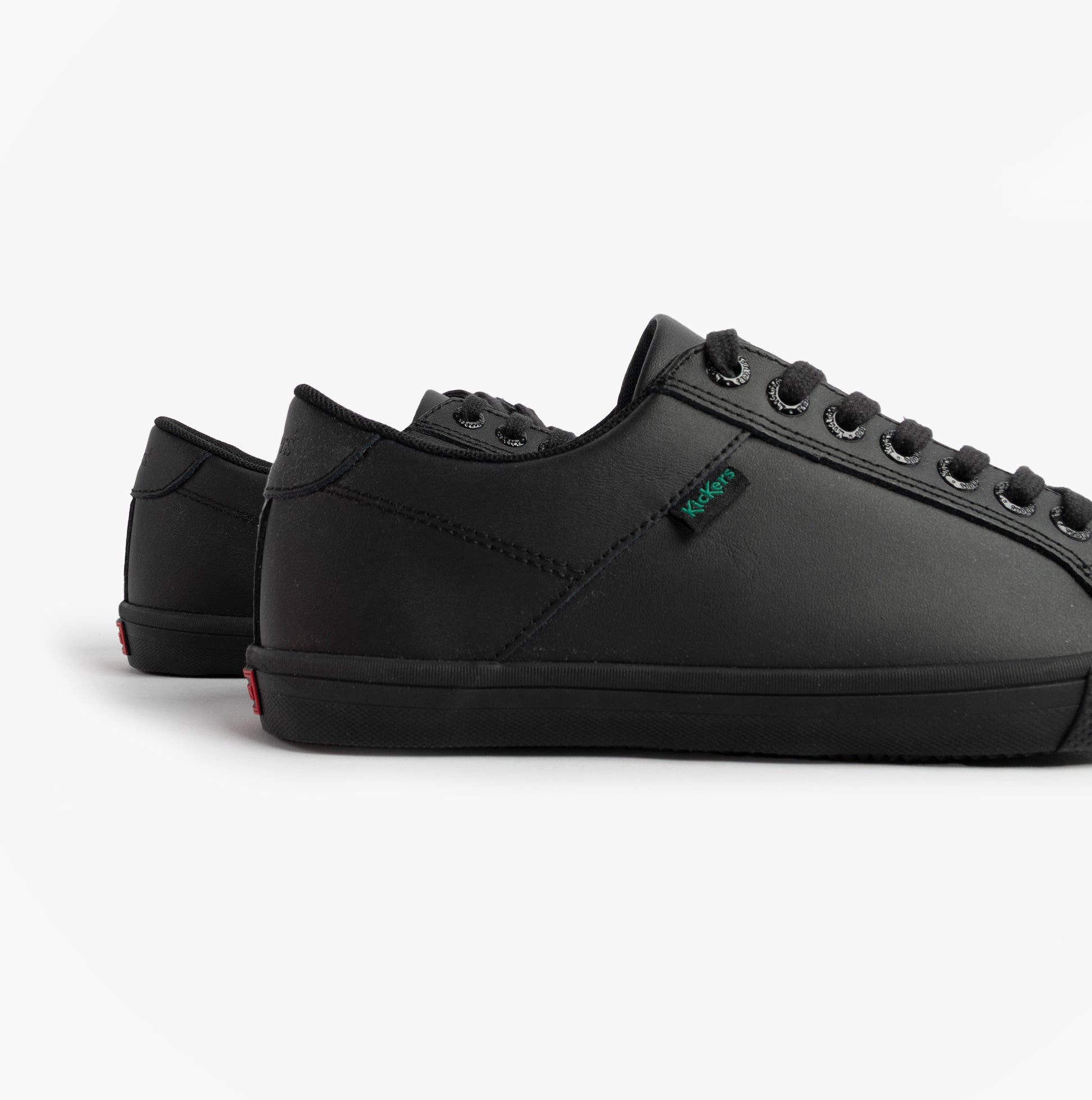 Kickers 116408 KODY LO Unisex School Shoes Black side view showcasing sleek design and lace-up closure.