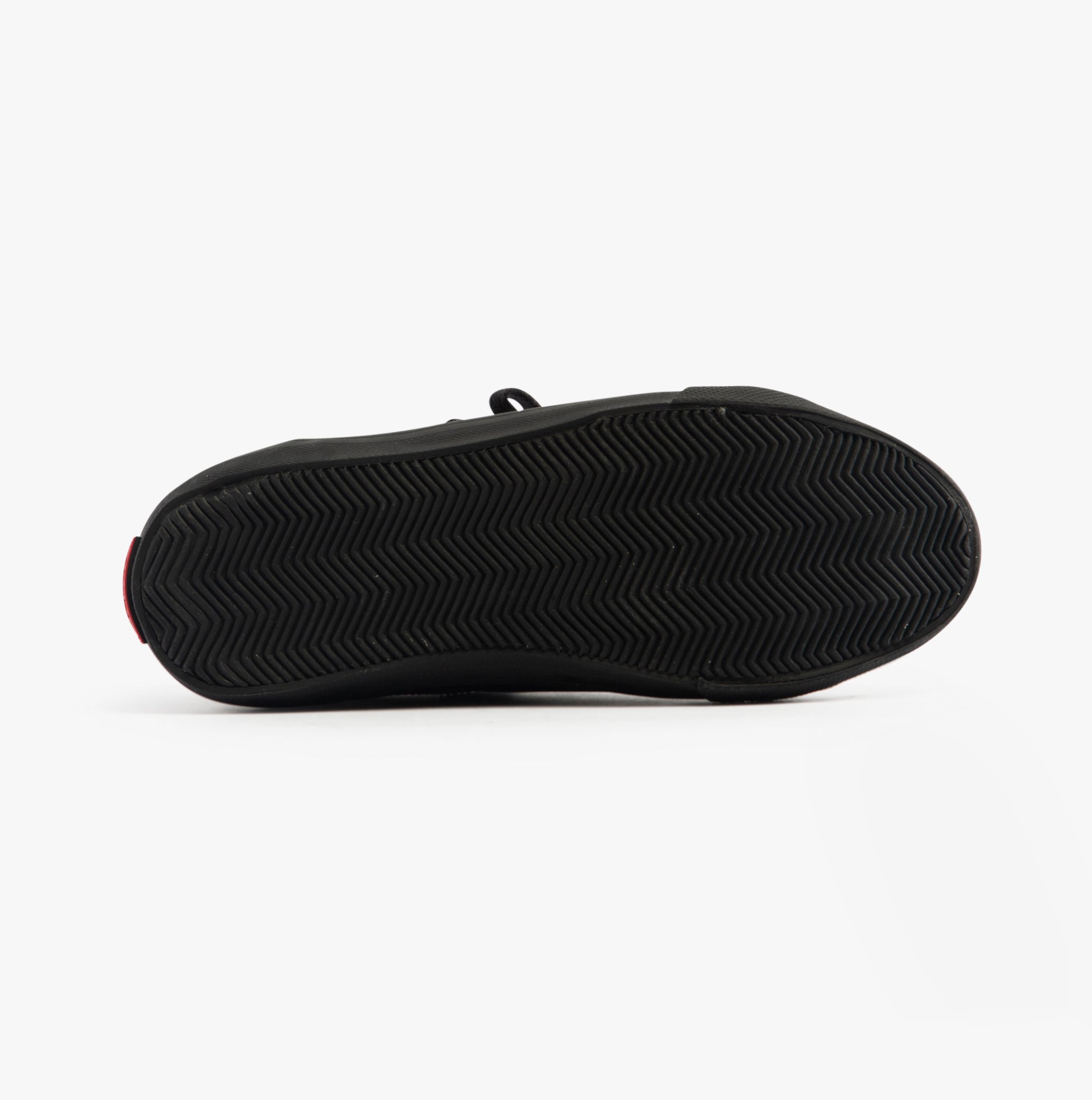 Kickers 116407 KODY LO Unisex School Shoes Black bottom view showcasing rubber sole with herringbone pattern.