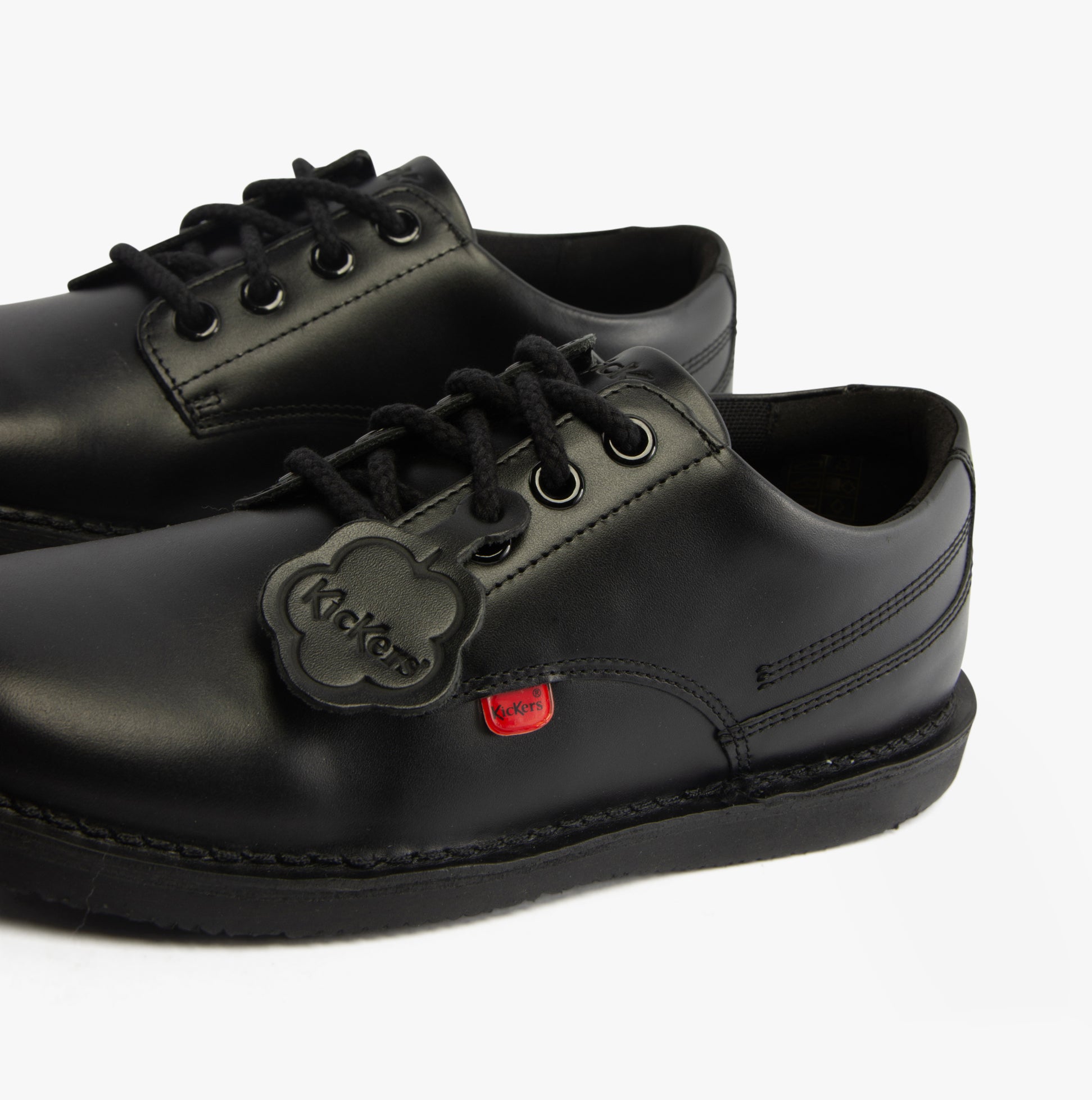 Kickers 117217 KOPI DERBY Boys School Shoes Black side view, showcasing leather upper and lace-up design.