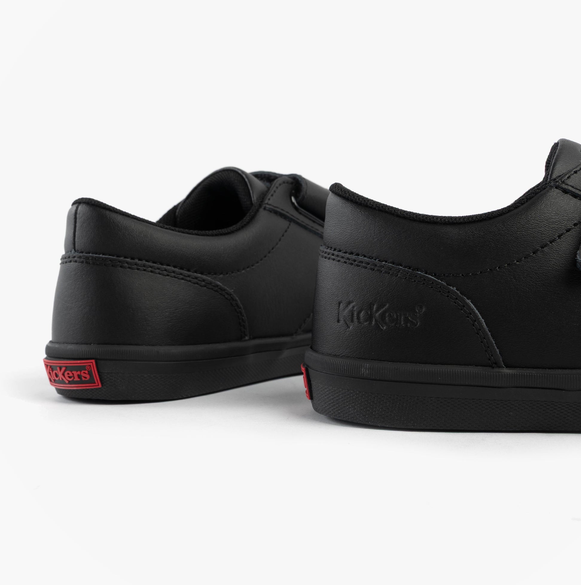 Kickers 117412 KODY TWIN Unisex School Shoes Black rear view showcasing sleek design and black leather finish.