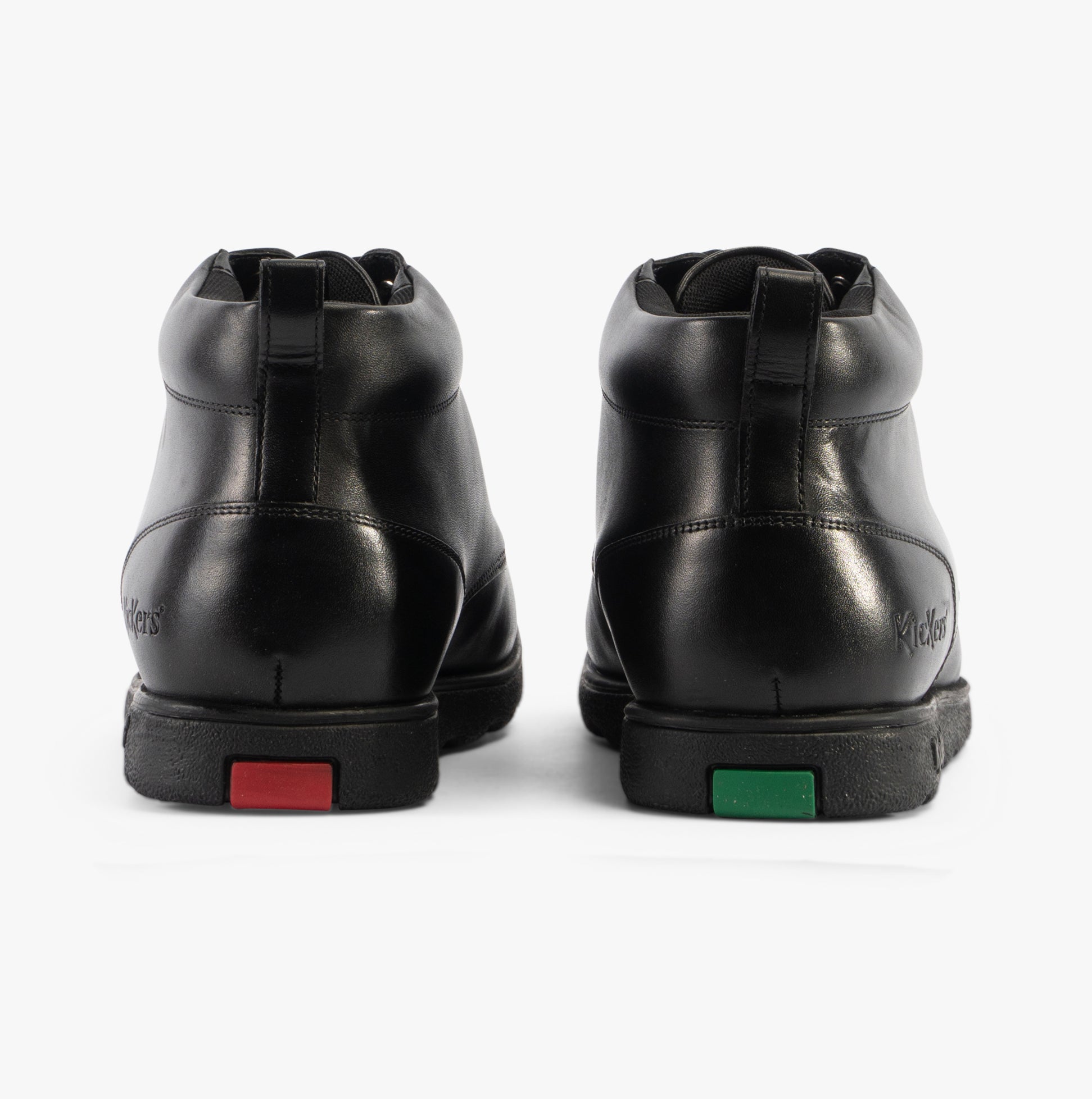Kickers 117606 FRAGMA CHUK Boys School Boots Black back view showing black leather material and colorful heel details.
