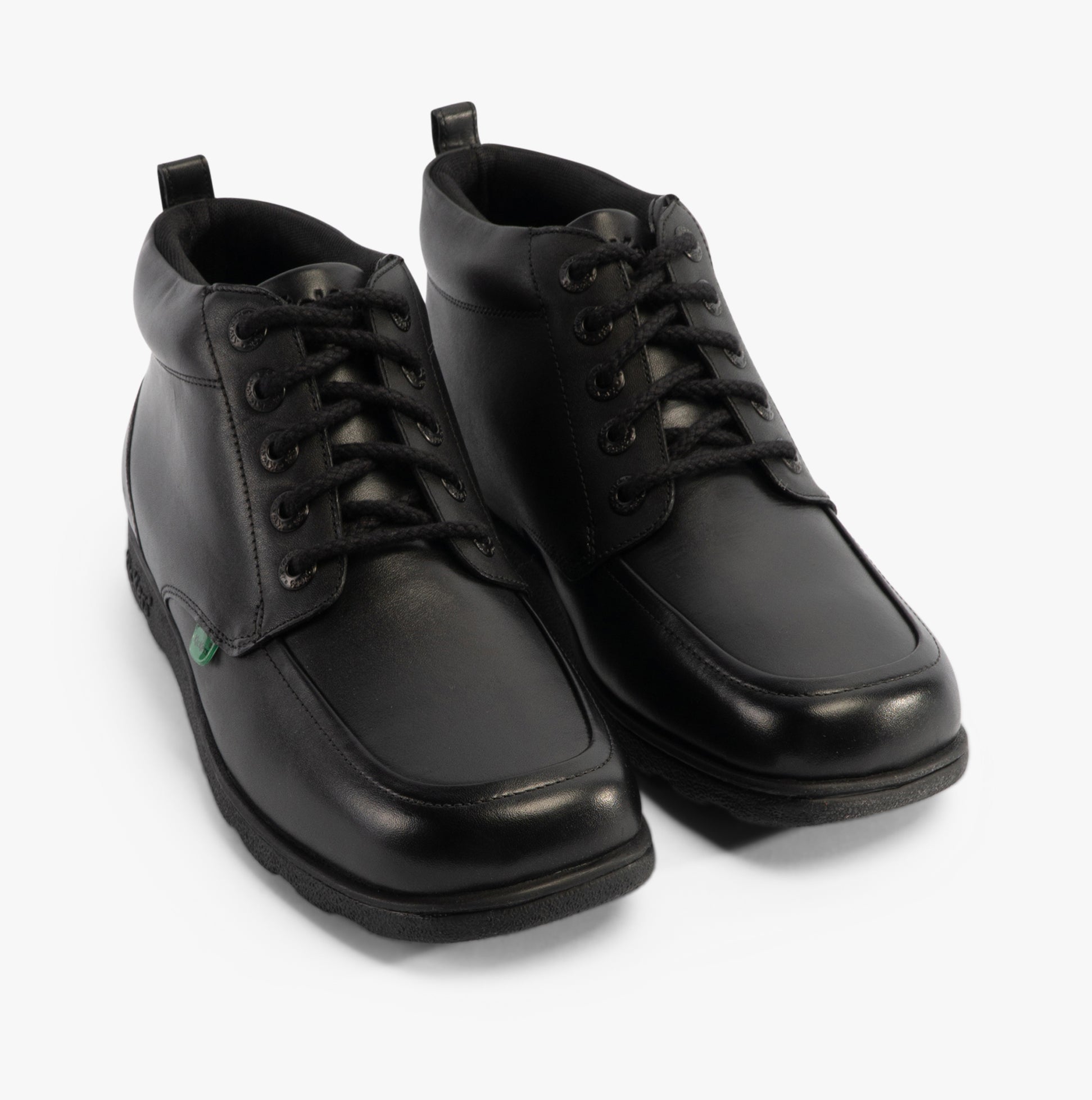 Kickers 117606 FRAGMA CHUK Boys School Boots Black front view featuring lace-up design and leather upper.