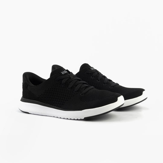 Kizik LIMA Unisex Adults Trainers Black side view showcasing knit upper and rubber sole.