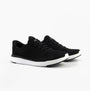 Kizik LIMA Unisex Adults Trainers Black side view showcasing knit upper and rubber sole.