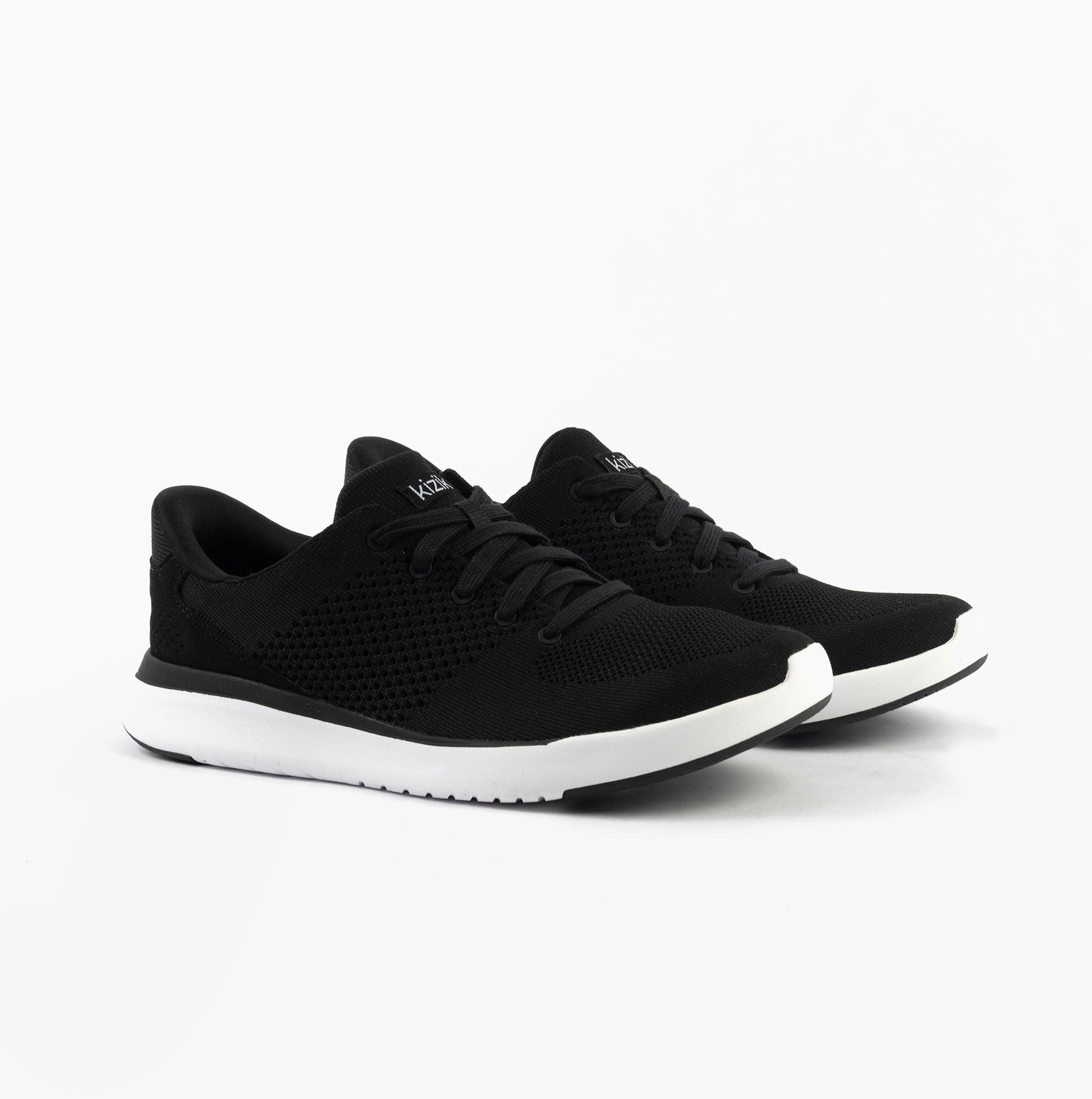 Kizik LIMA Unisex Adults Trainers Black side view showcasing knit upper and rubber sole.