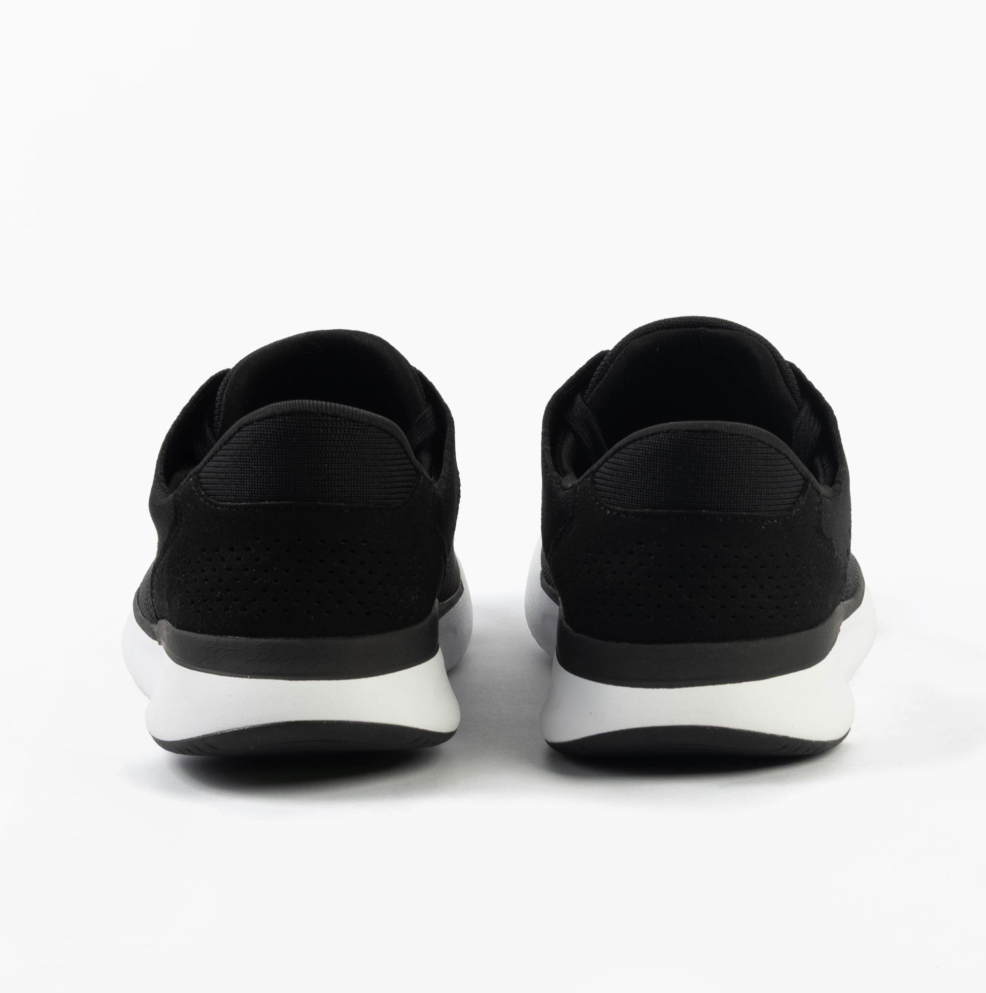 Kizik LIMA Unisex Adults Trainers Black rear view showcasing the casual knit design and rubber sole.