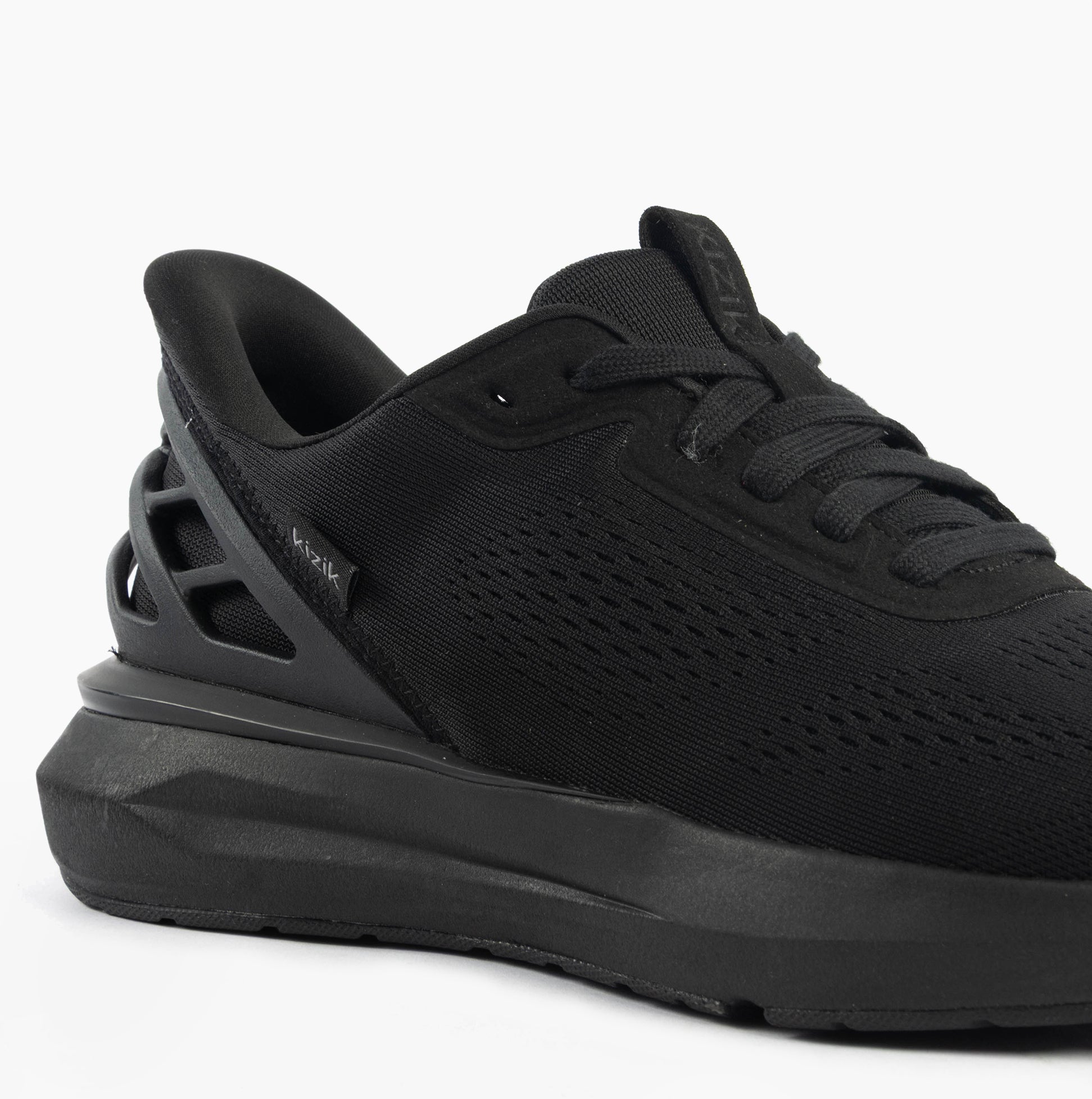 Kizik ATHENS 2.0 Mens Trainers Blackout side view showing knit upper and rubber sole features.