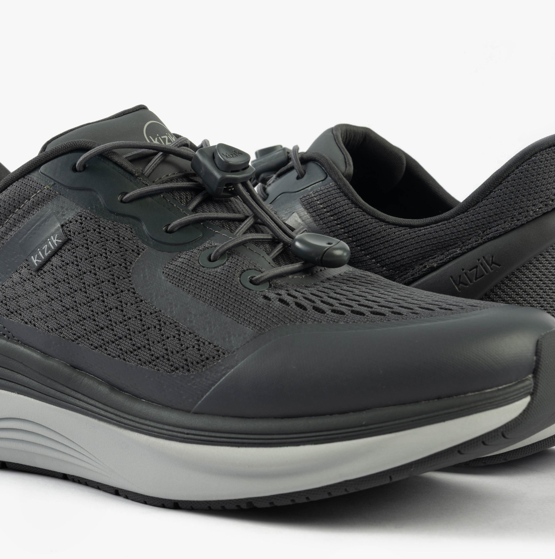 Kizik LONDON Mens Trainers Castlerock side view featuring grey mesh upper and lace-up closure.