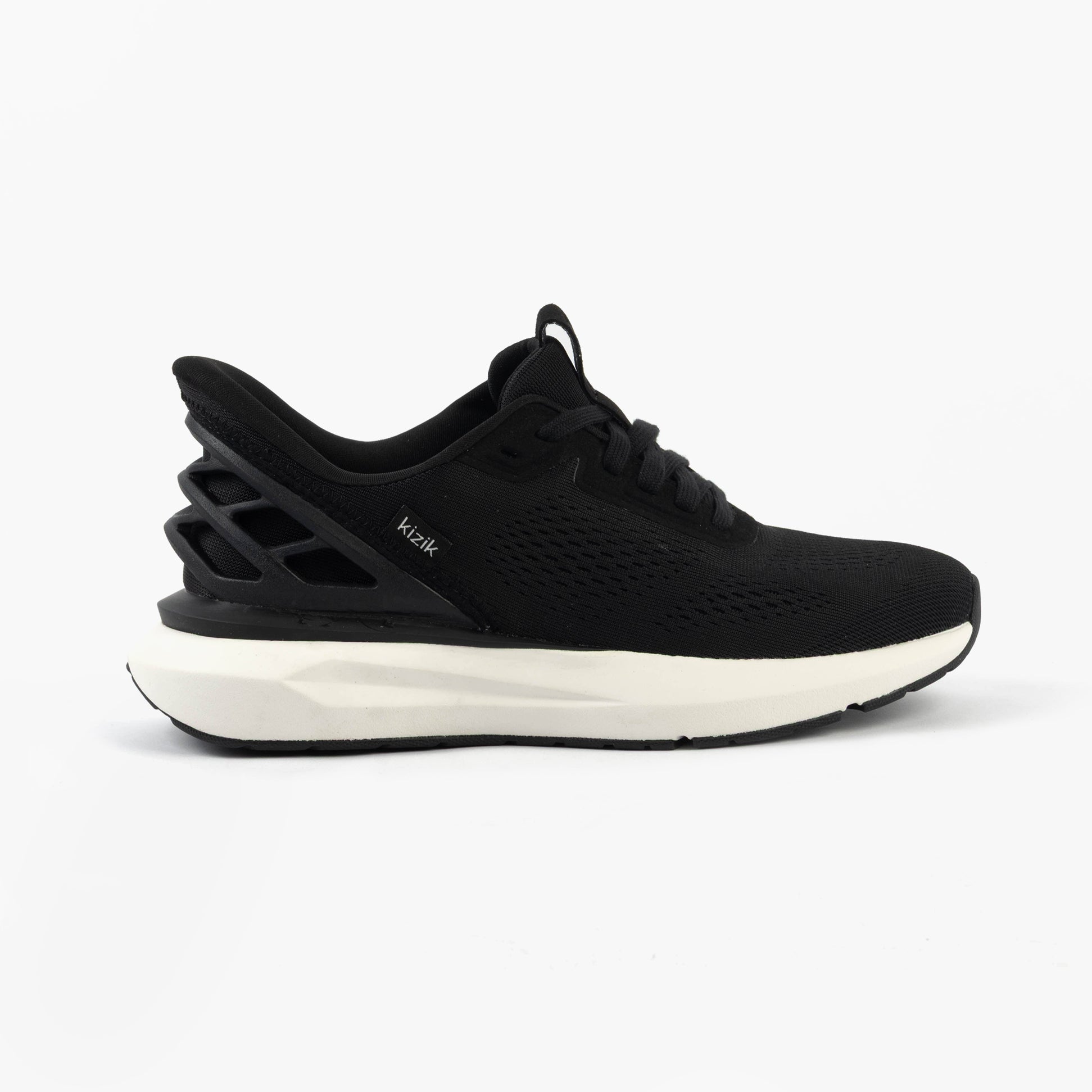 Kizik ATHENS 2.0 Womens Trainers Black side view featuring a stylish low-top design with mesh upper.
