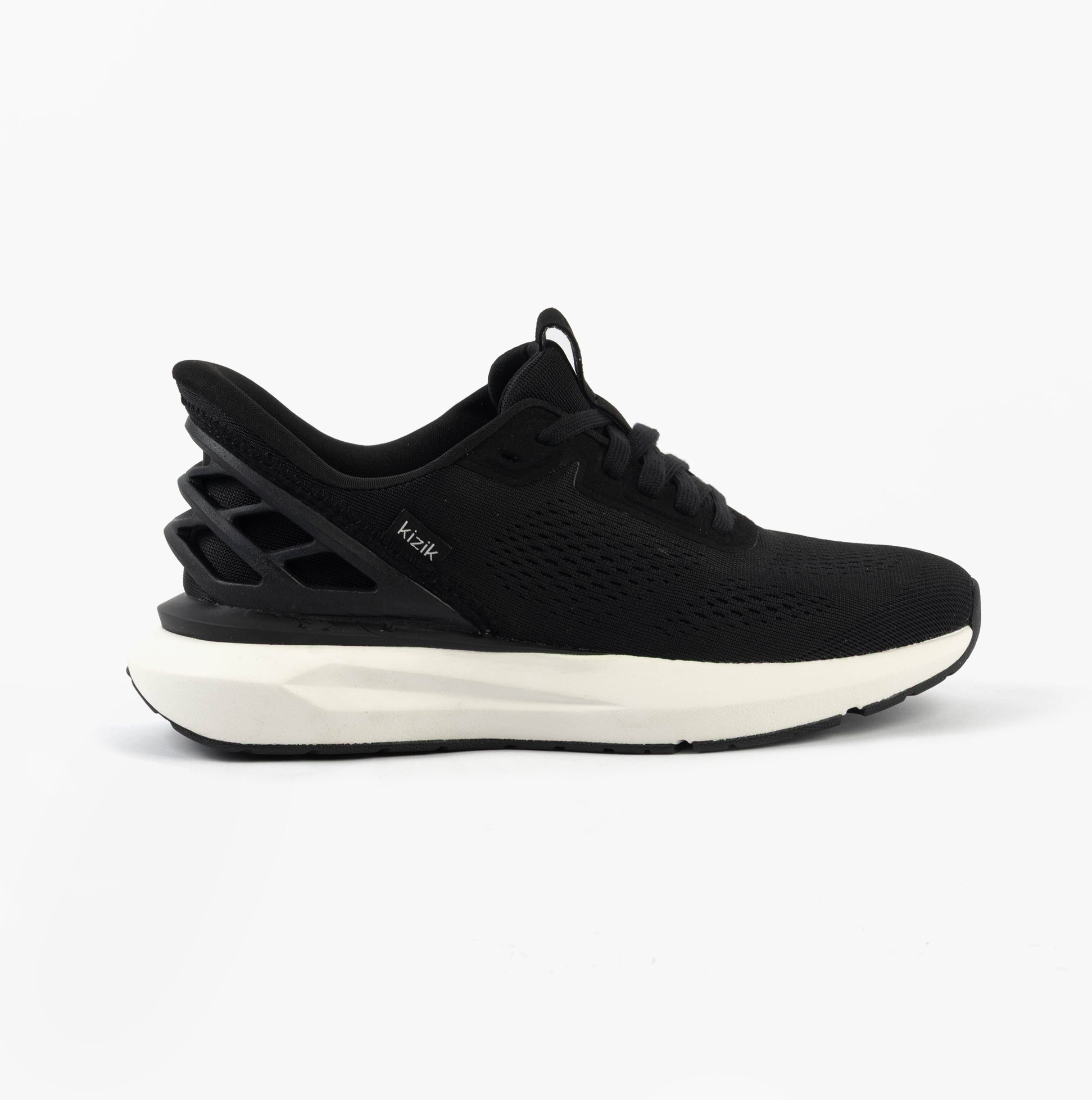 Kizik ATHENS 2.0 Womens Trainers Black side view featuring a stylish low-top design with mesh upper.