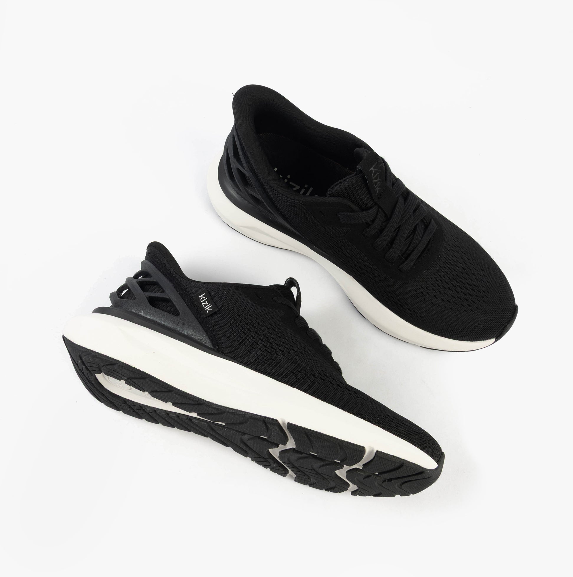 Kizik ATHENS 2.0 Womens Trainers Black top view showcasing mesh upper and sleek design.