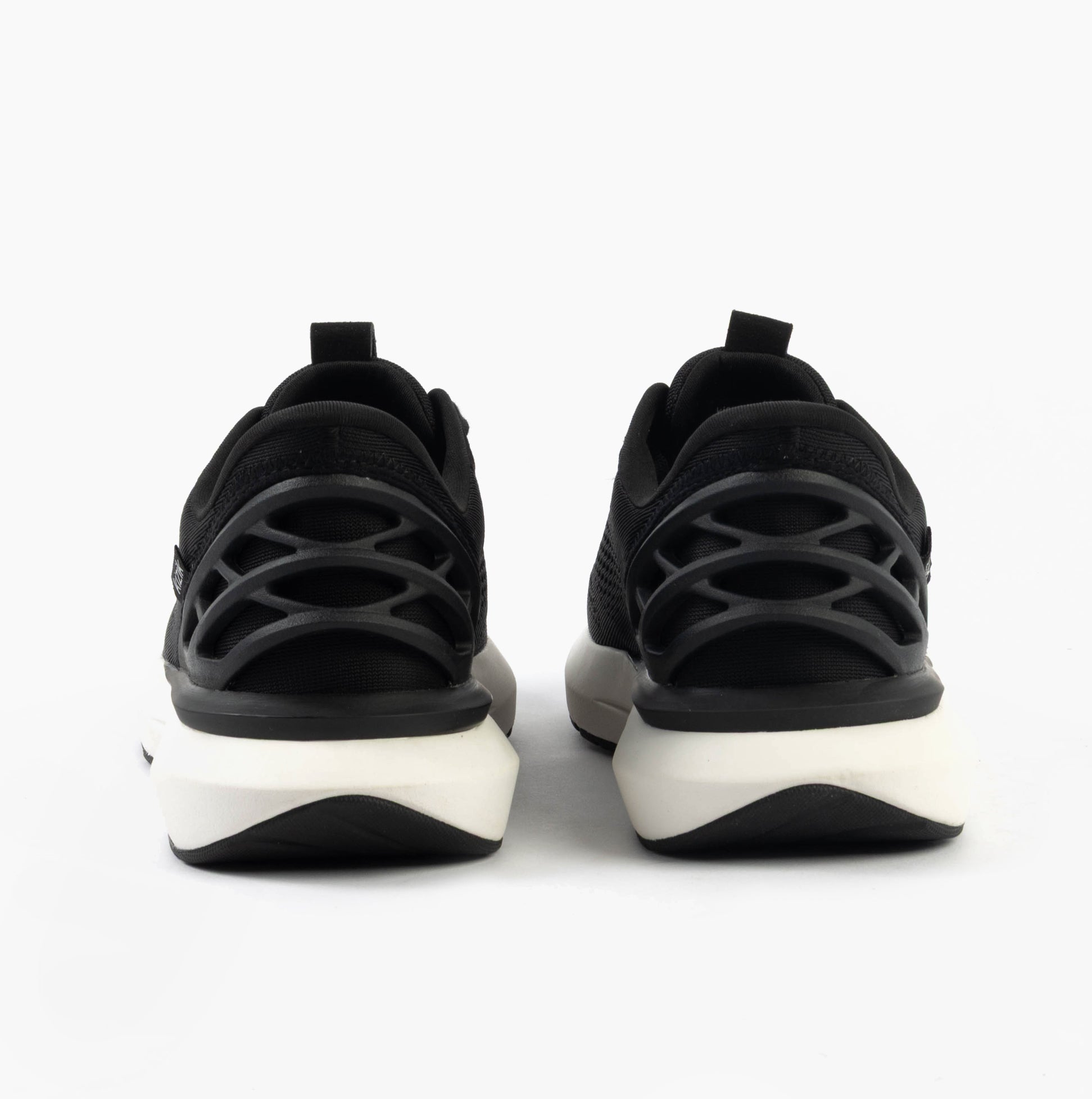 Kizik ATHENS 2.0 Womens Trainers Black rear view showcasing black mesh upper and rubber sole.