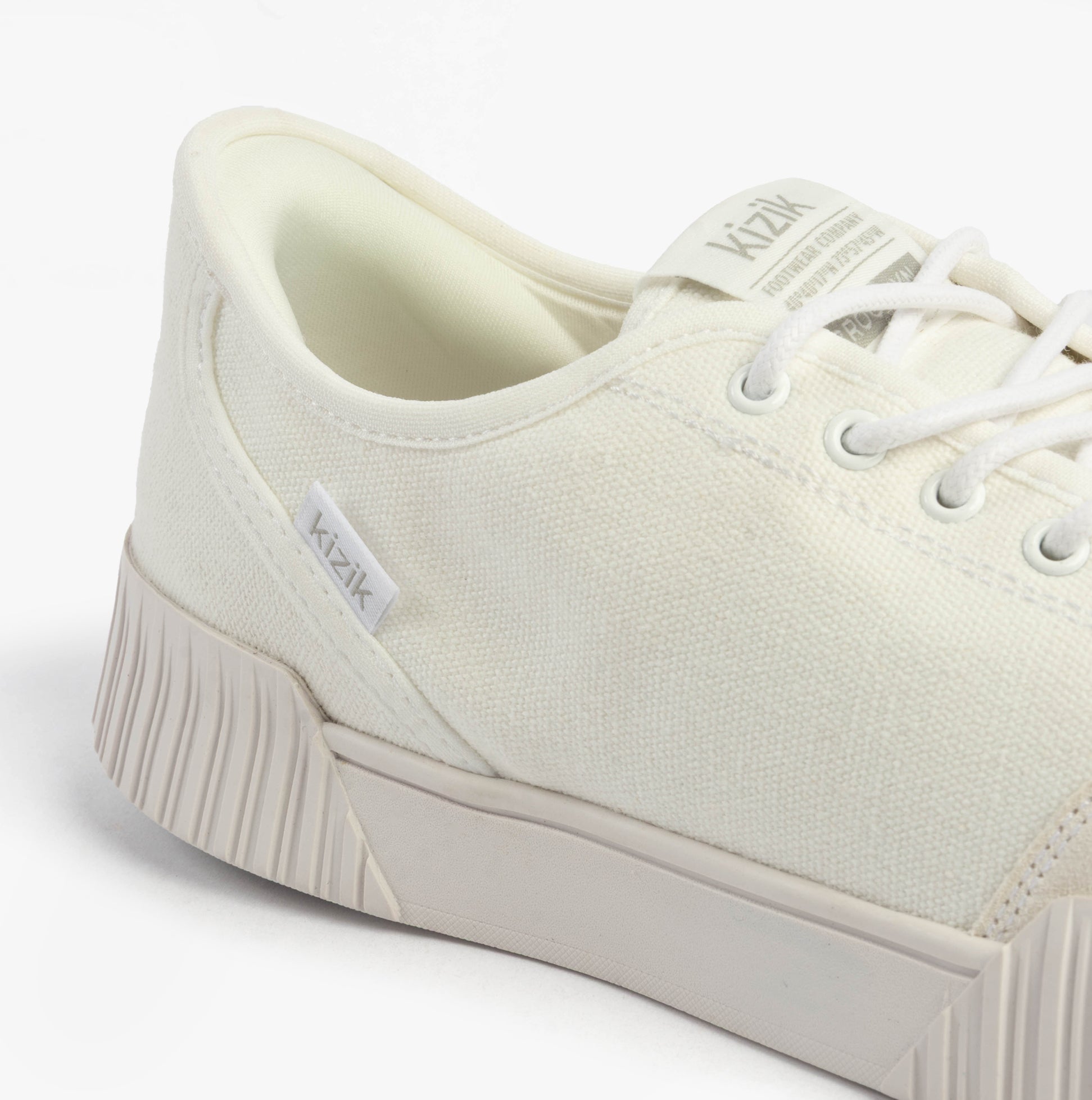 Kizik BROOKLYN Womens Trainers Bright White detail view showcasing the canvas upper and lace-up closure.